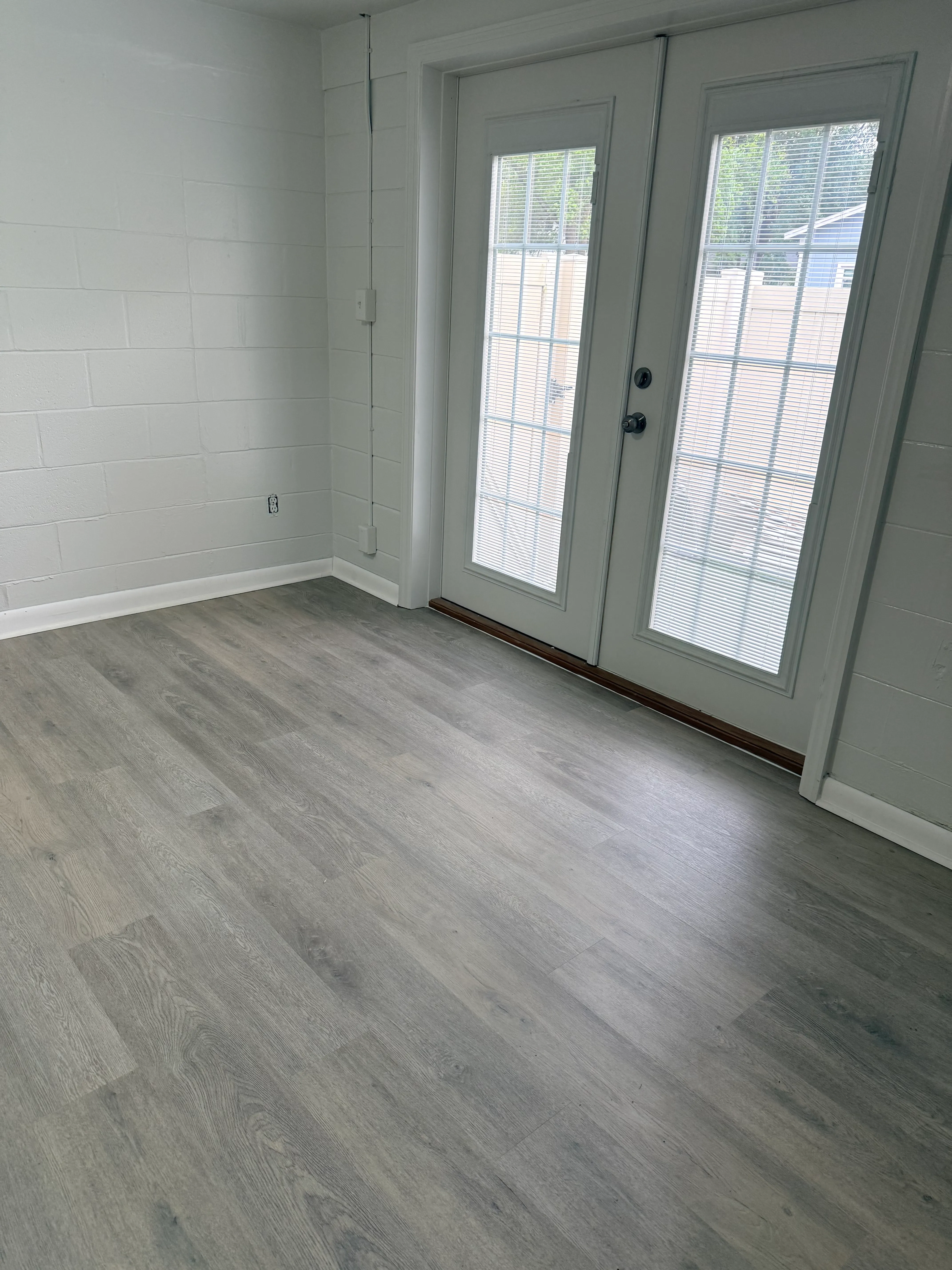 Bedroom after lvp flooring installation in East Lake Morton, Lakeland, FL