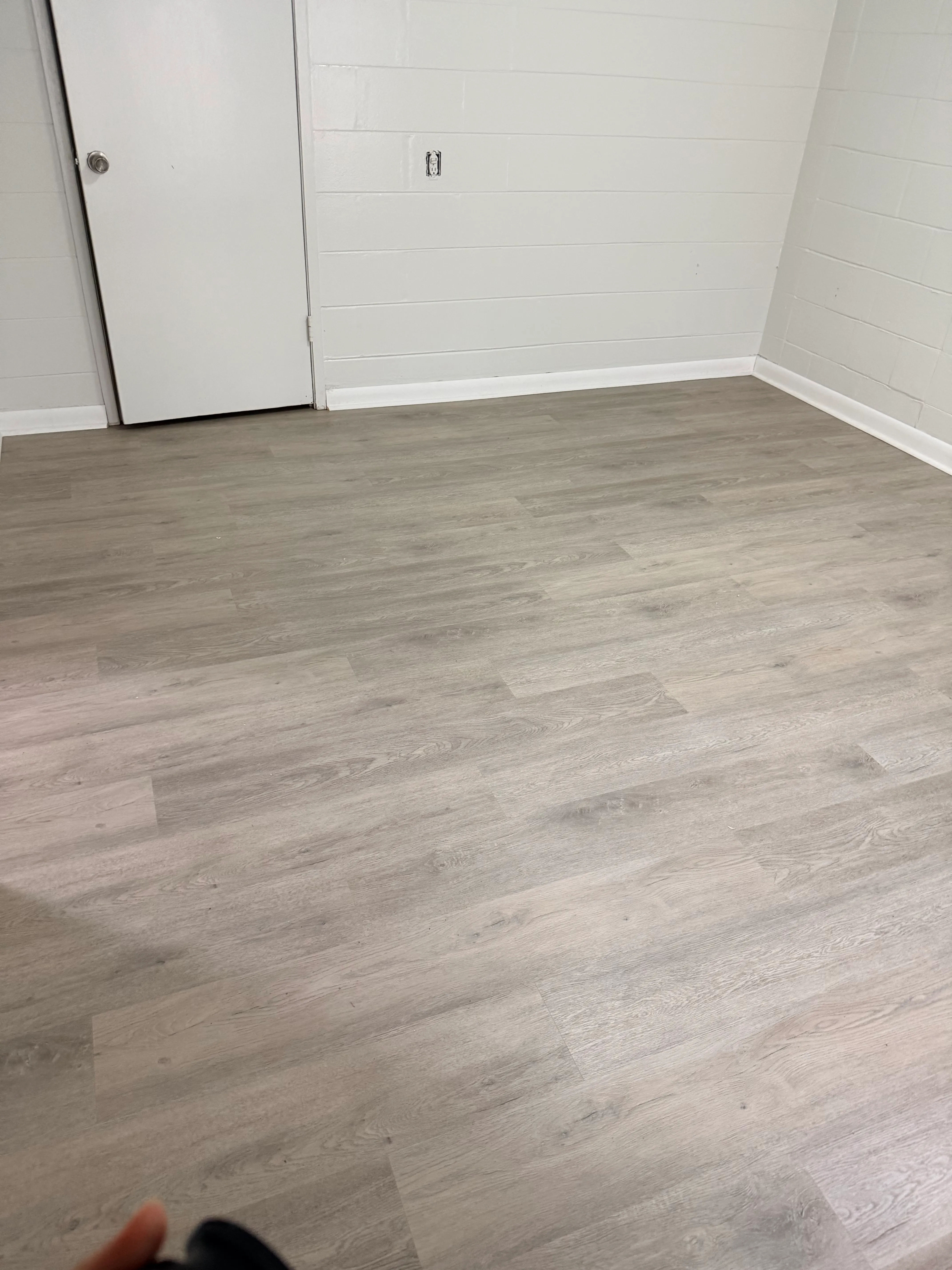 Bedroom floor close-up after lvp flooring installation in East Lake Morton, Lakeland, FL