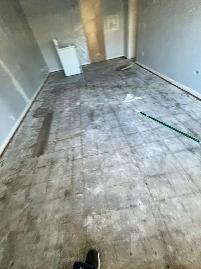 Living room before lvp flooring installation in East Lake Morton, Lakeland, FL