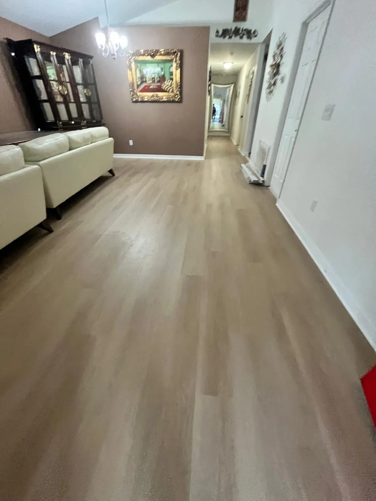 Living room after LVP flooring installation in Lake Hunter Terrace, Lakeland, FL