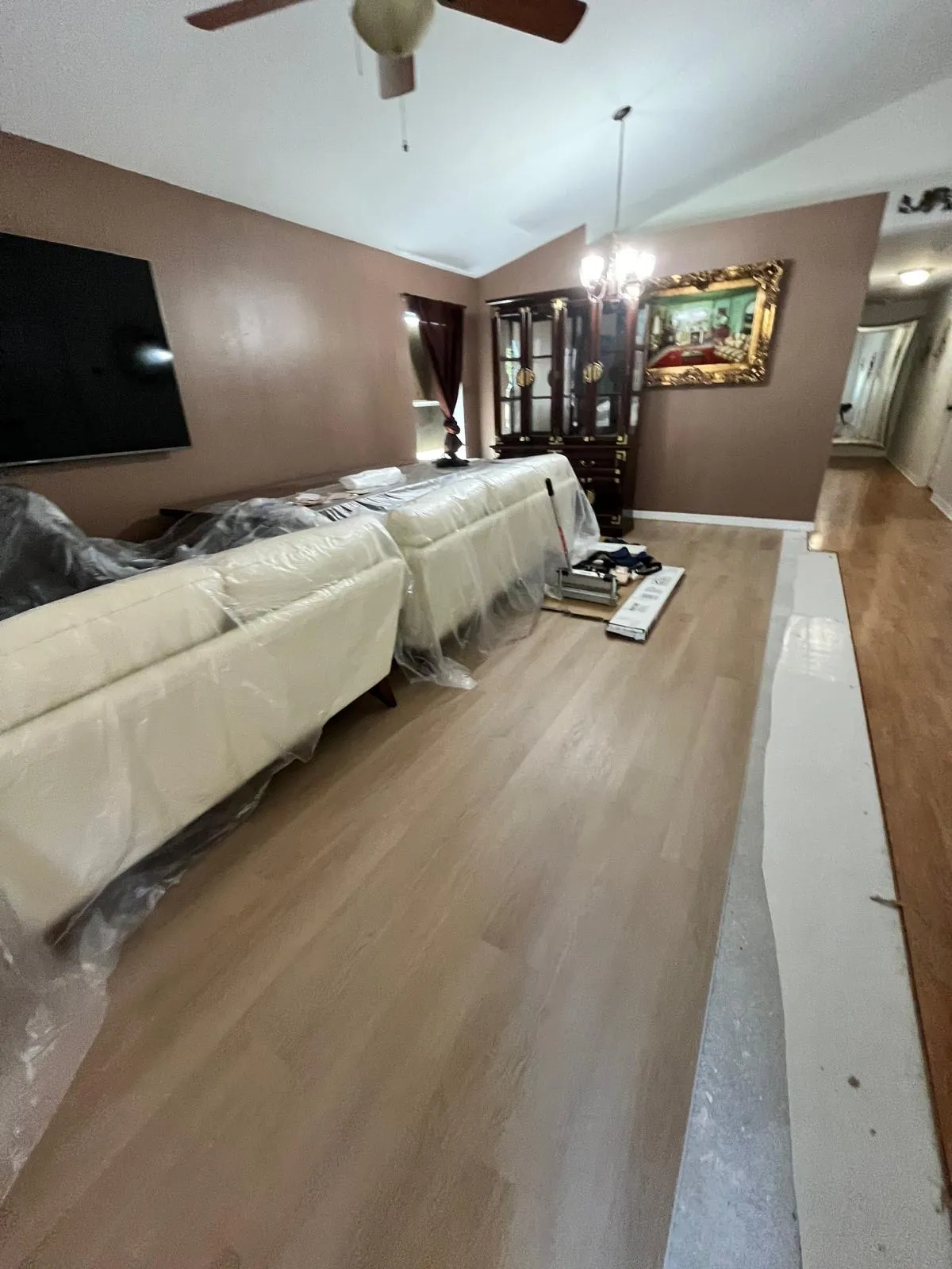 LVP flooring living room clean installation in progress in Lake Hunter Terrace, Lakeland, FL