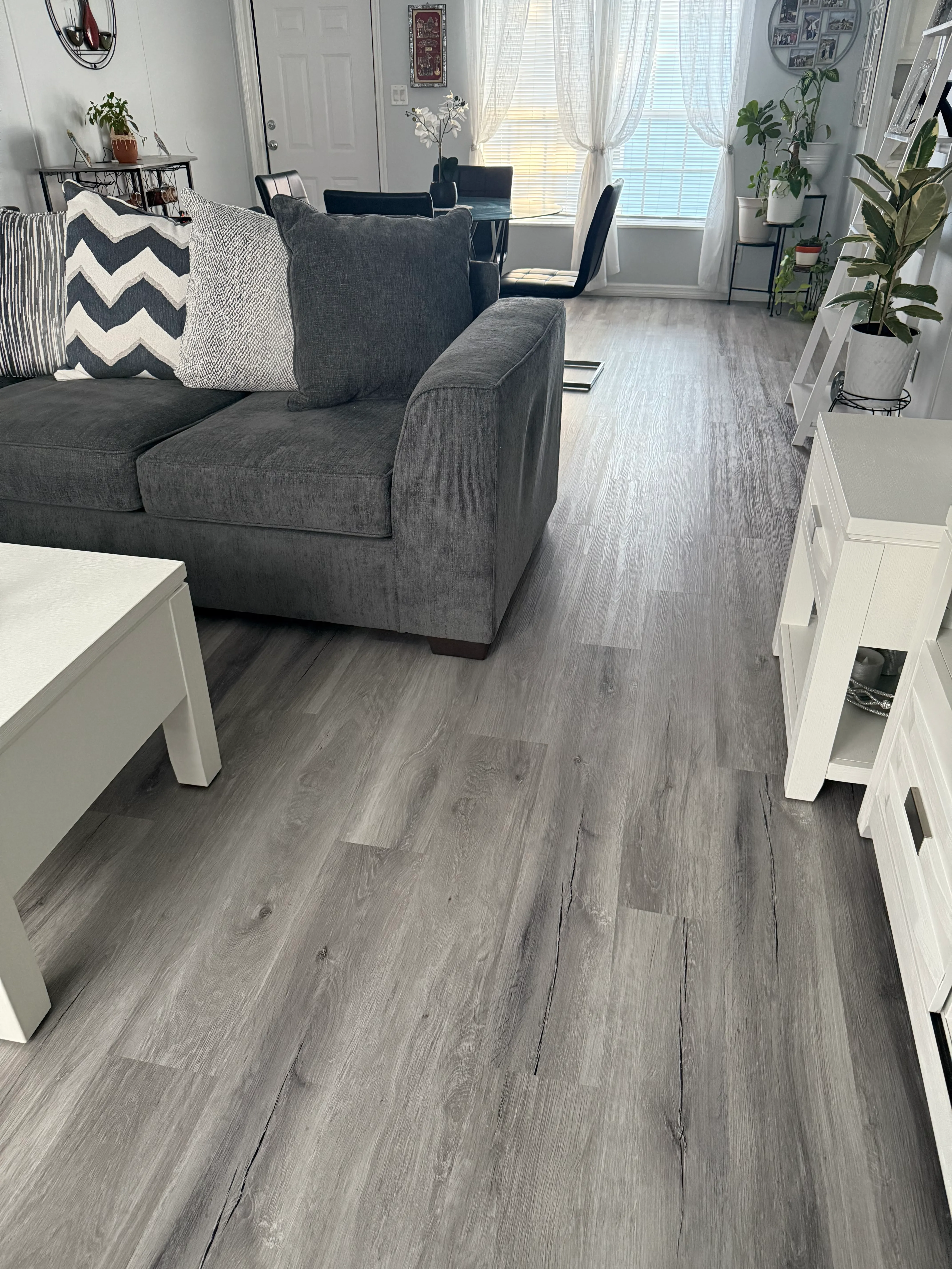 Living room after lvp flooring installation in Parkwood Estates, Plant City, FL