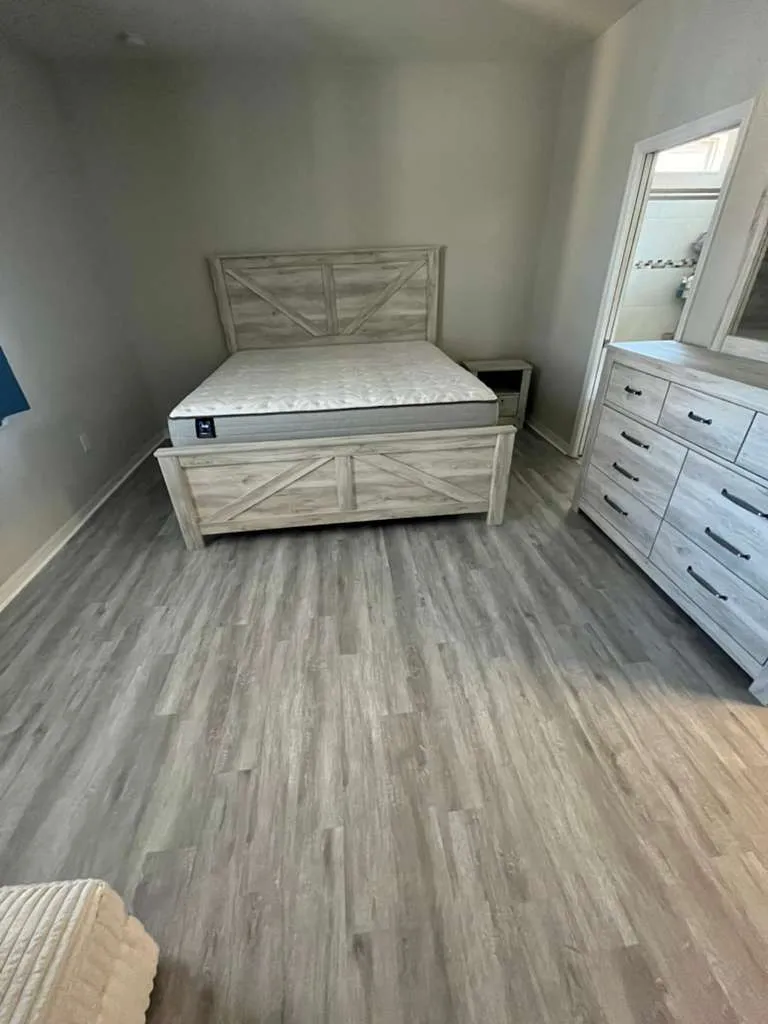 Master bedroom after LVP flooring installation in Fountain Park, Polk City, FL