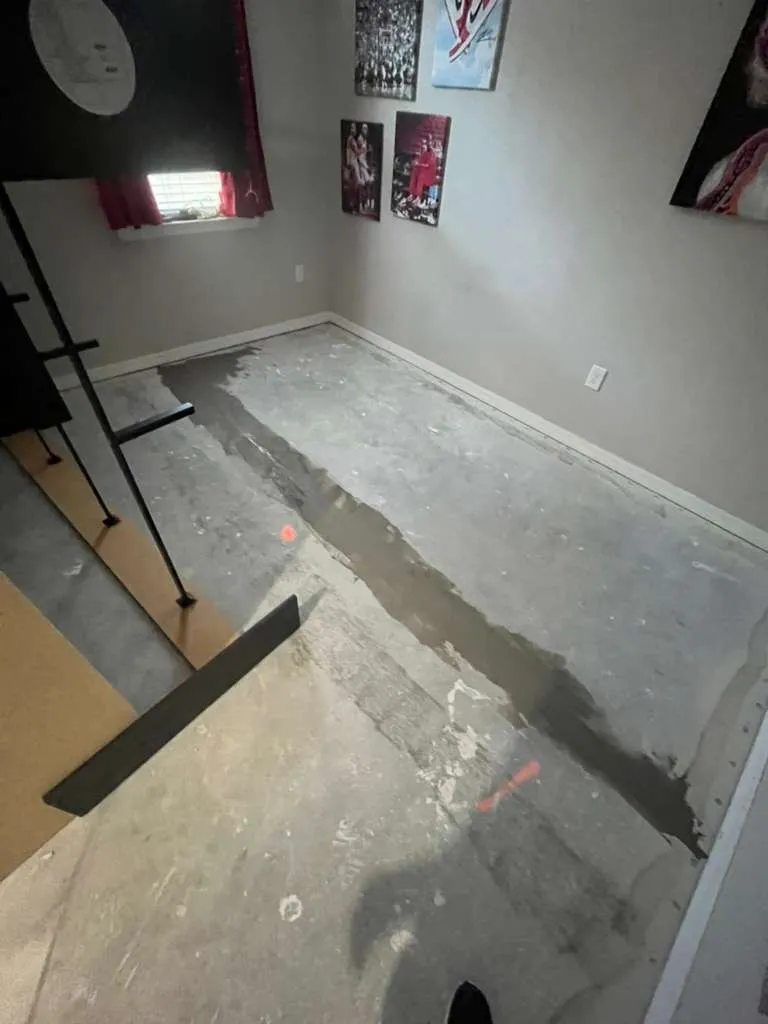 Bedroom 1 before LVP flooring installation in Fountain Park, Polk City, FL