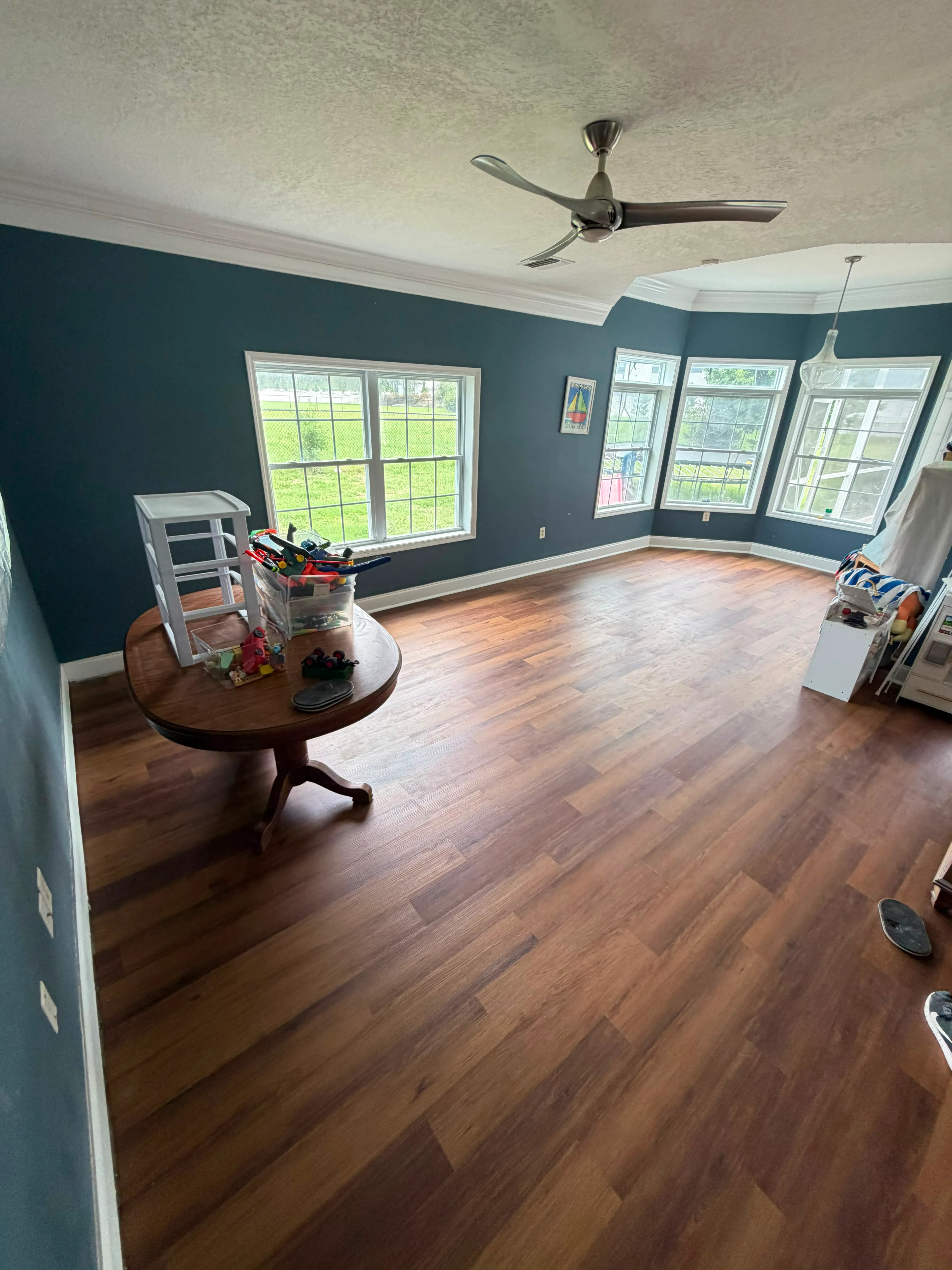 Living room after LVP flooring installation in Plant City, FL