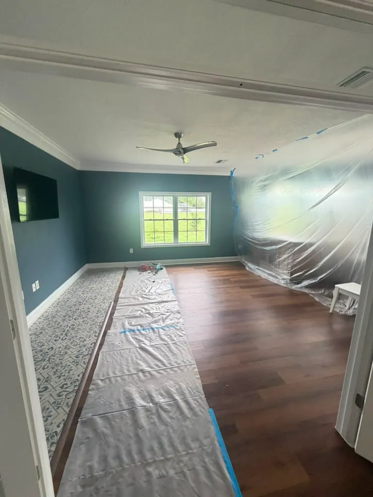 Living room before LVP flooring installation in Plant City, FL