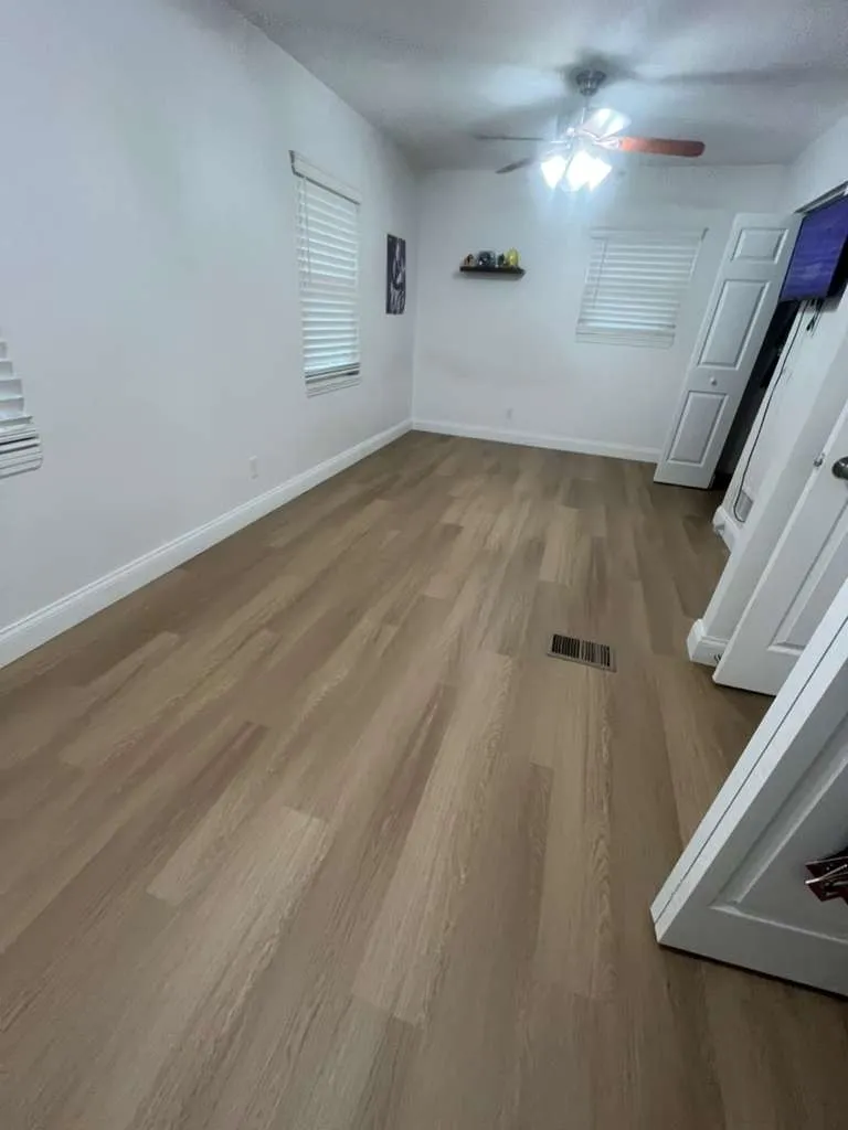 Bedroom after LVP flooring installation in Cleveland Heights, Lakeland, FL