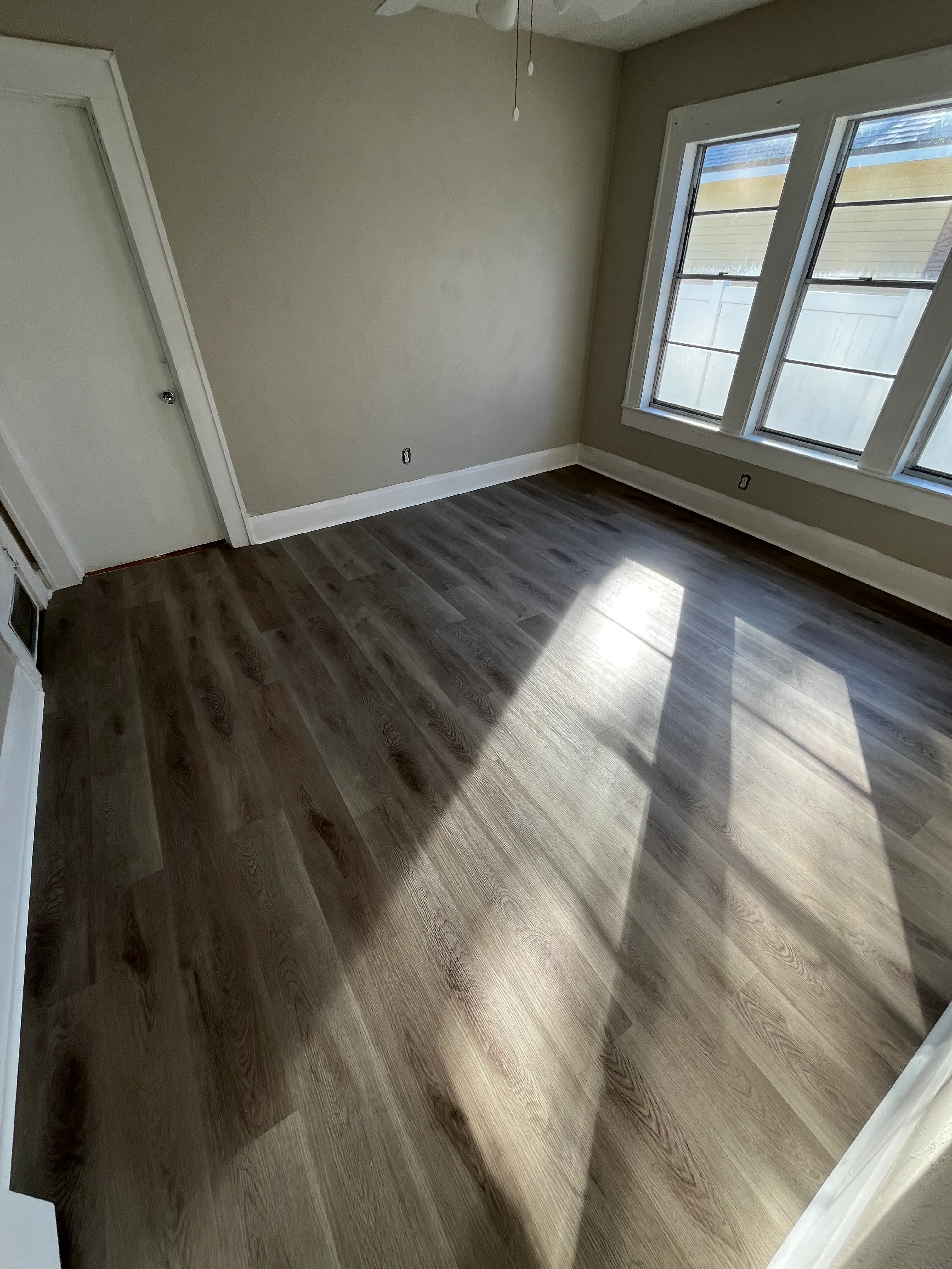Bedroom after LVP flooring installation in Lake Hunter Terrace, Lakeland, FL