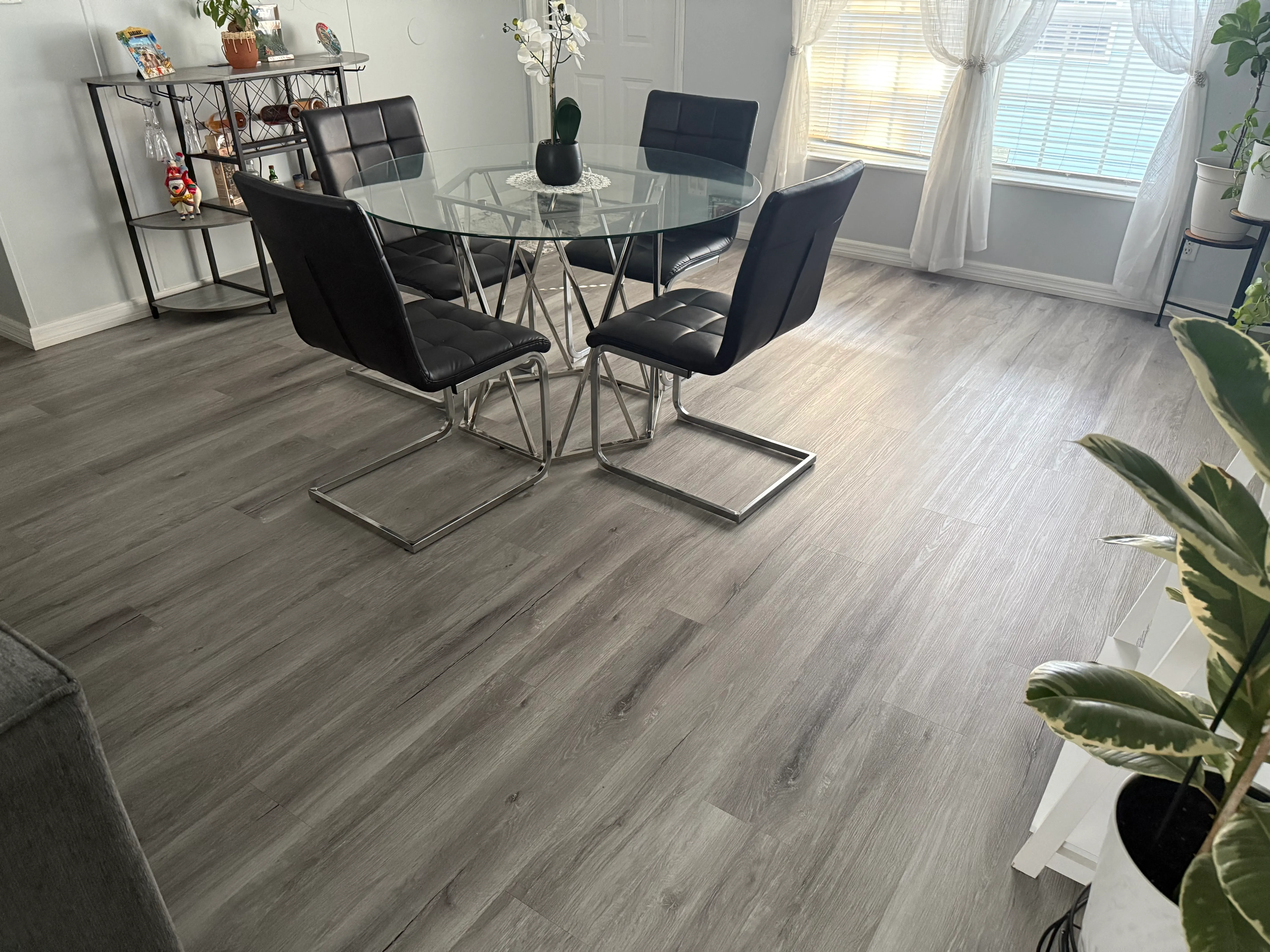 Dining room after lvp flooring installation in Parkwood Estates, Plant City, FL
